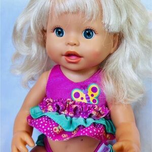 Mattel Blonde Baby Doll in Hot Pink and Turquoise Ruffle Outfit